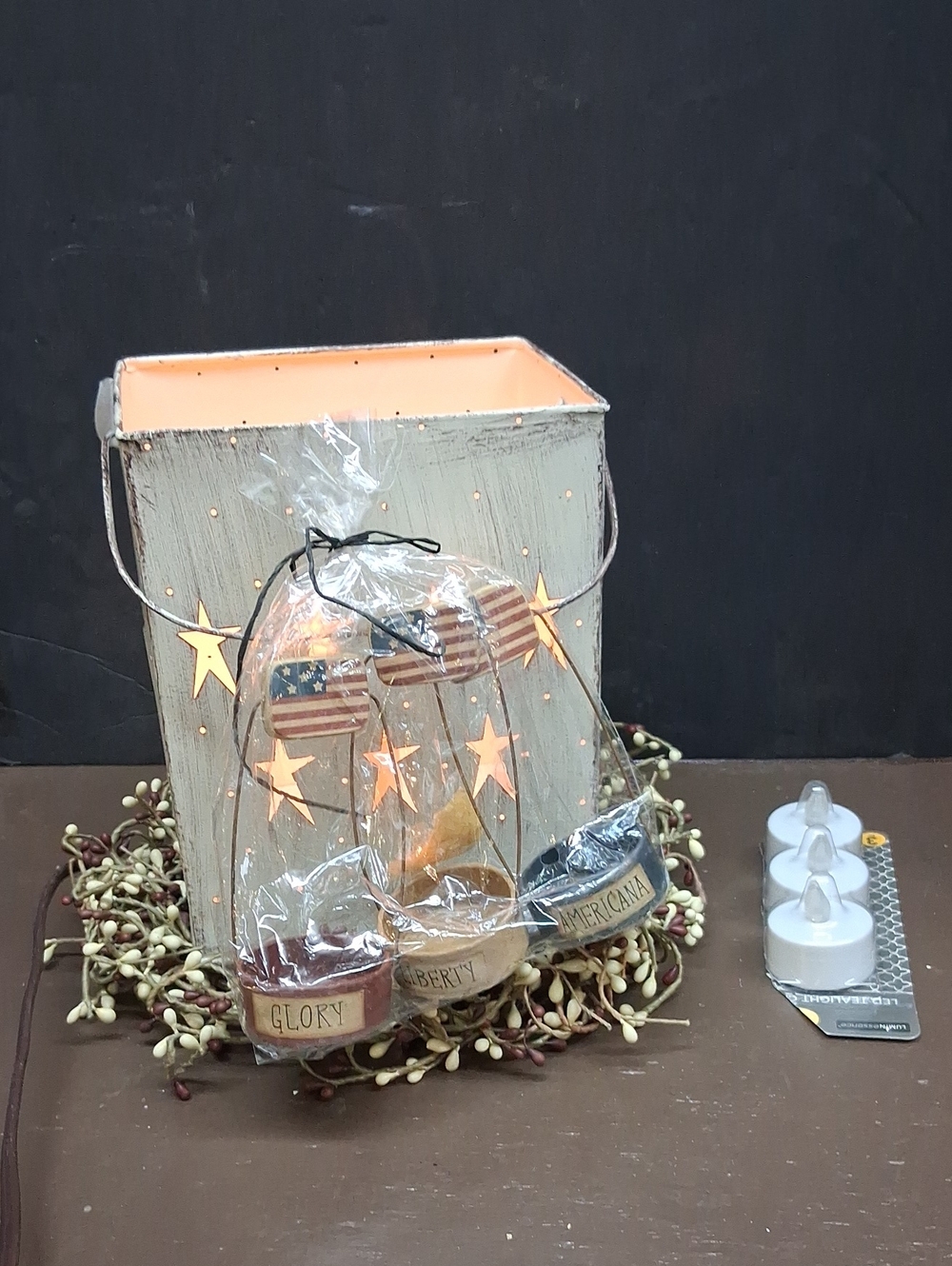 Americana lighted stars and red, white,‎ blue flag candleholders with pip ring